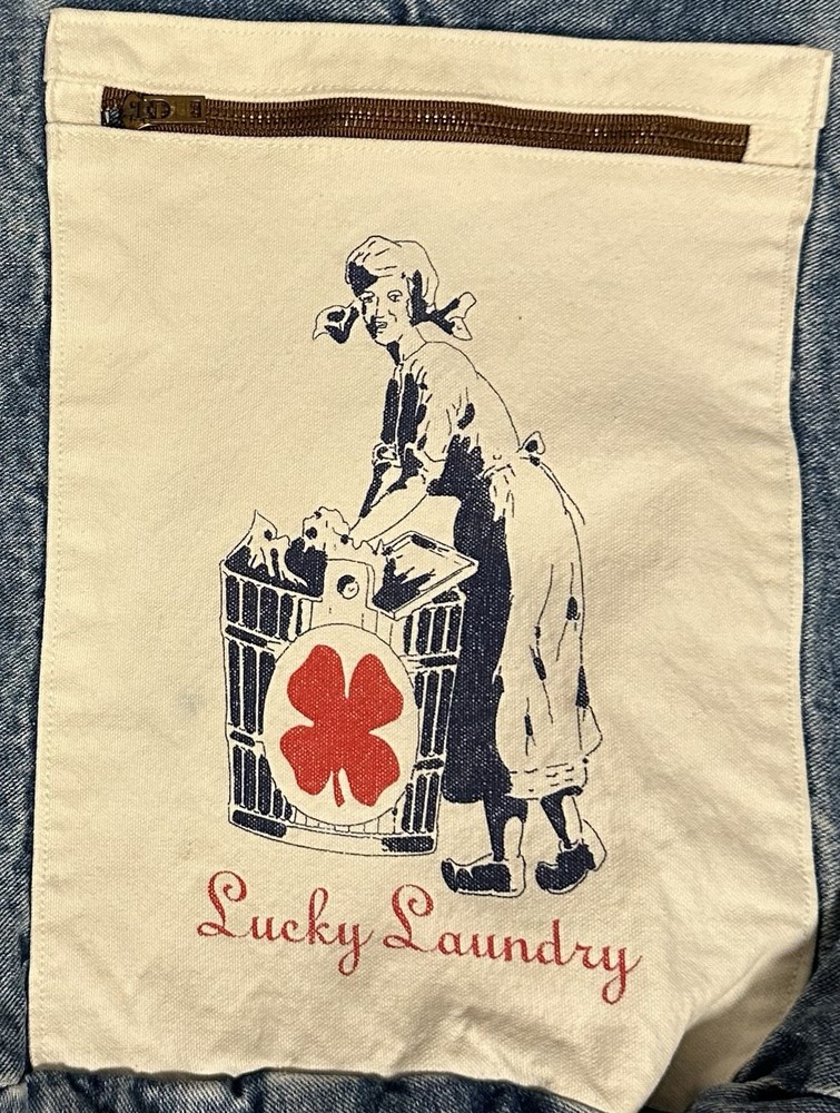 A vintage denim drawstring laundry bag 23 X 17.5.