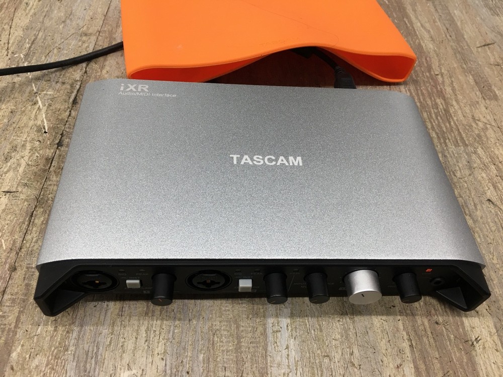 Tascam iXR USB Audio/MIDI Interface With iOS Connectivity and cable.