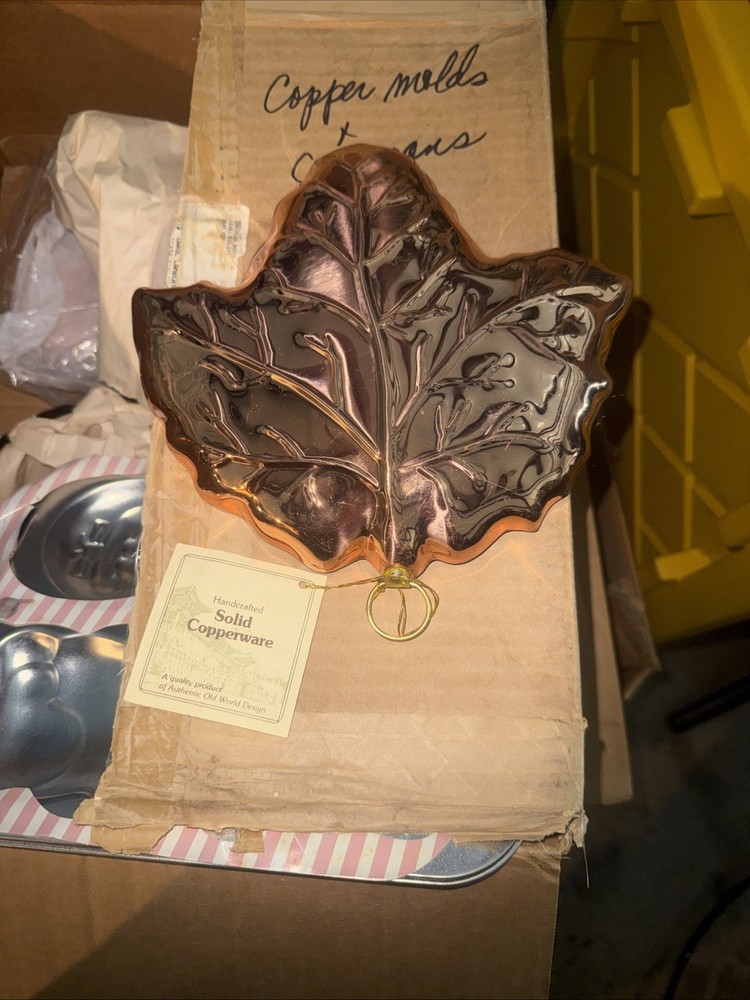 vintage handcrafted solid copper leaf-shaped dish or wall decoration.