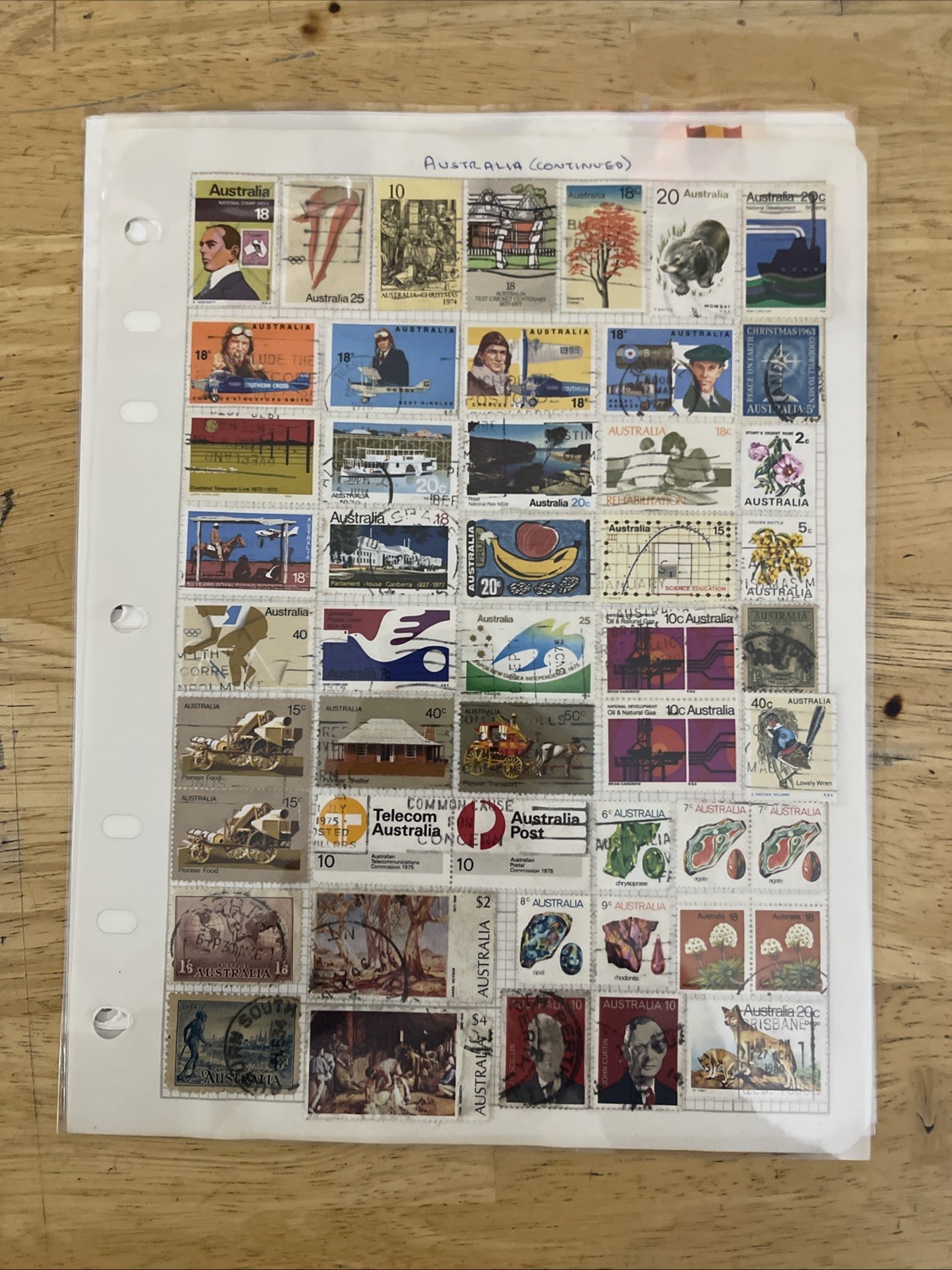Lot of new and used stamps from all over the world. ON Paper.