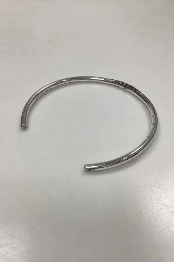 Modern Open Neck Ring in unmarked silver