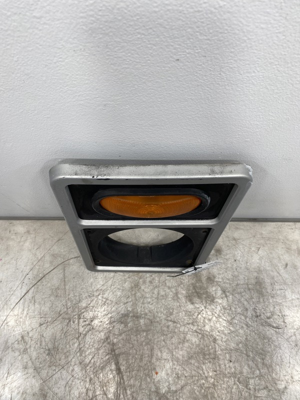2000 Mack LE613 Light Bezel (710-10406)