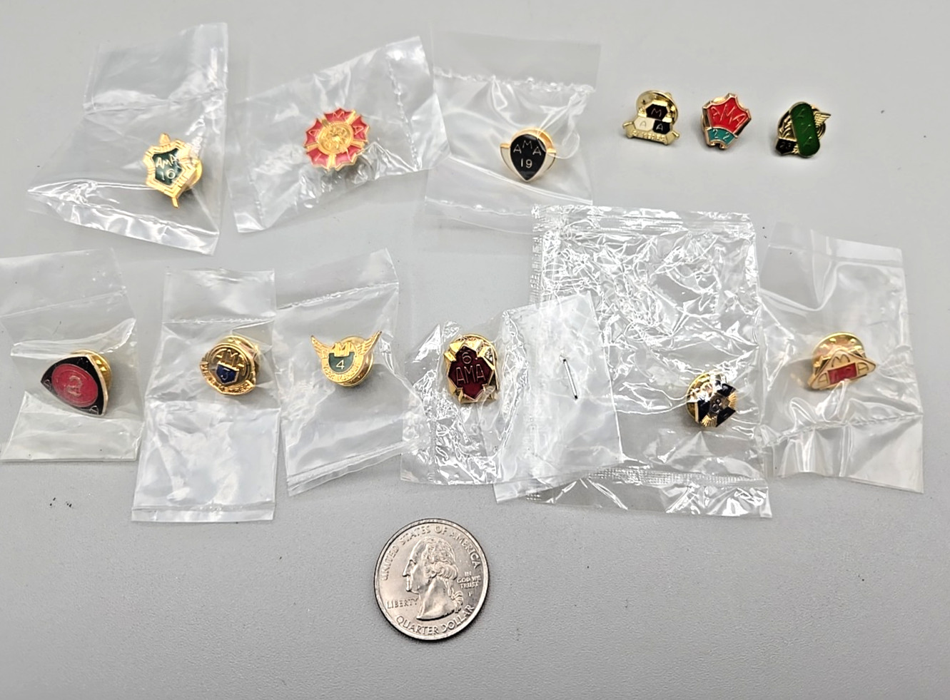 Collection of 17 AMA American Motorcycle Association Membership Pins. New