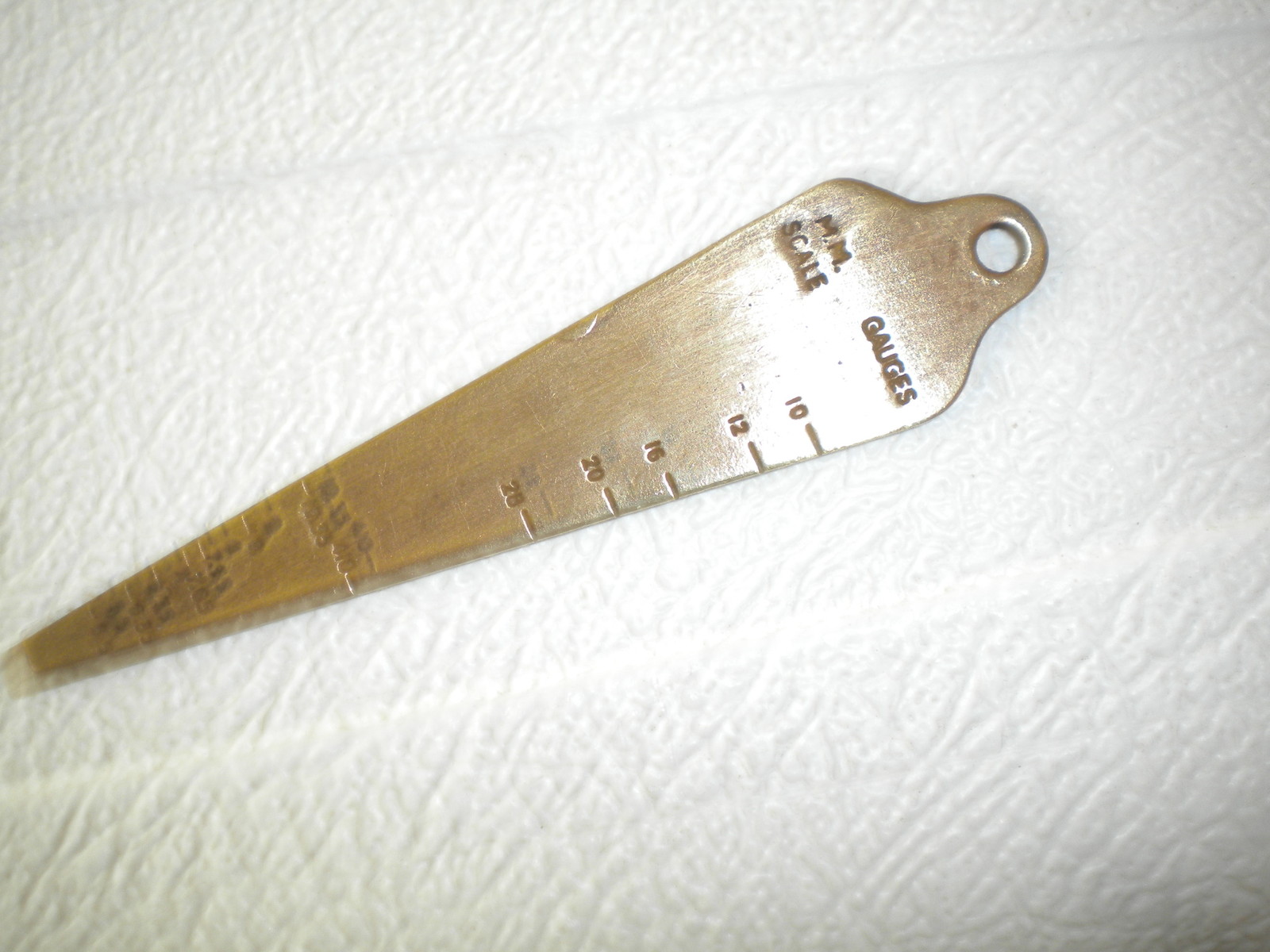 Colt firearms Brass gun bore guage advertising