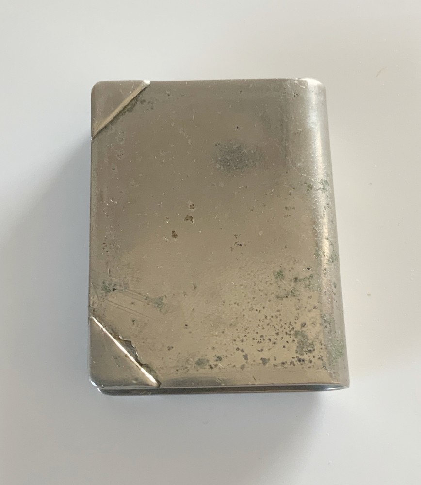 WWII era trench art lighter book