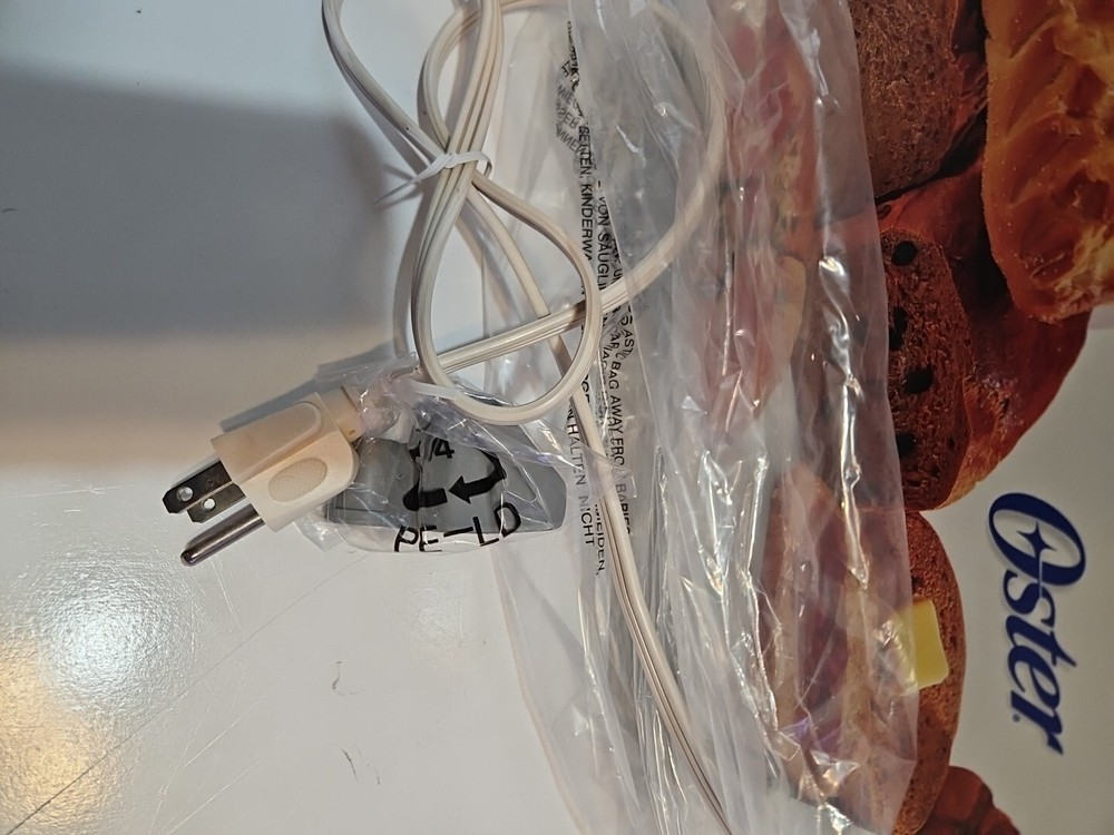 Oster Bread Maker Machine 58-Minute Express Bake 2 lb Model 5834