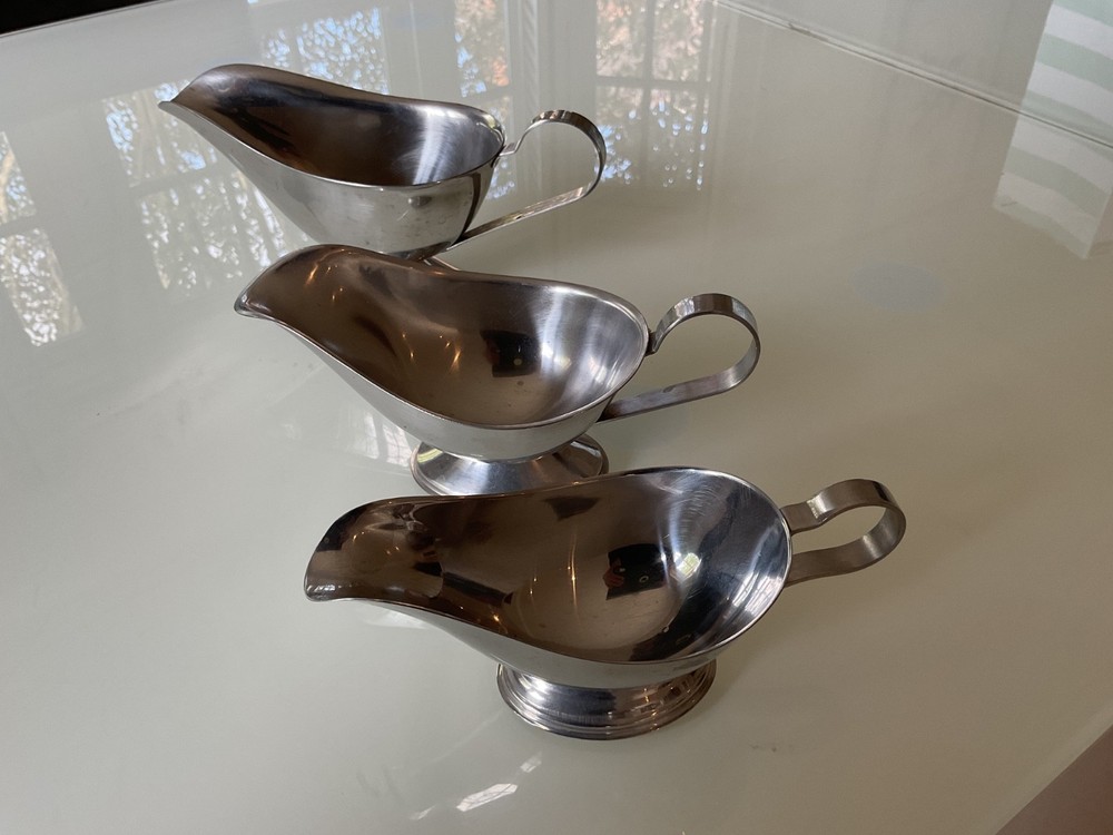 THREE SILVER COLOUR SAUCE BOATS GRADUATED