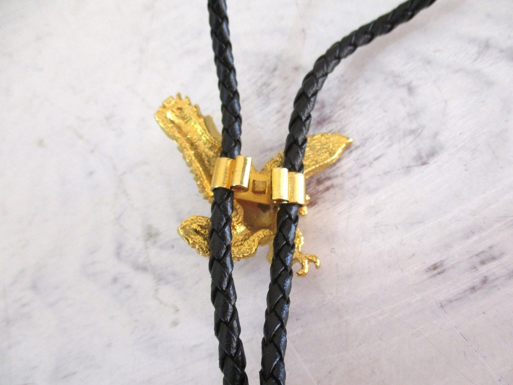 Golden Eagle with Black Leather Bolo Tie