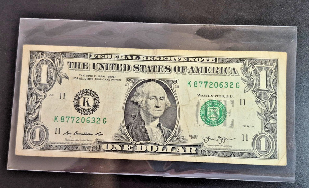 2013 One Dollar Note Over Inked Serial Number, "7"