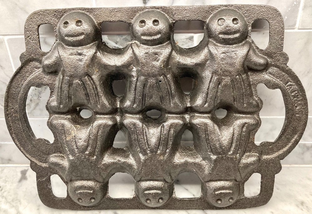 CAST IRON GINGERBREAD MAN PAN