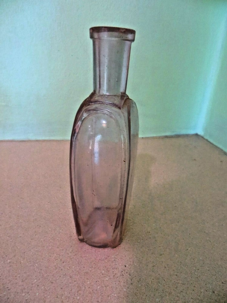 APPLIED LIP SIDE MOLD SEAMS TO BOTTOM SHEARED TOP UNKNOWN BOTTLE