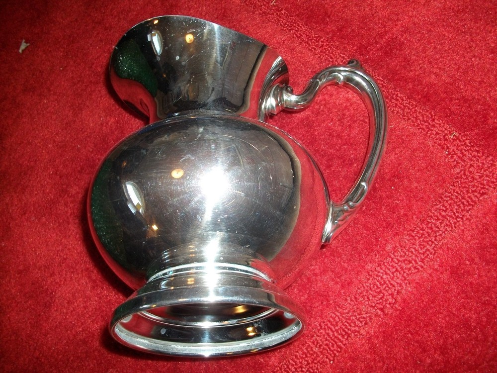 Oneida silver water pitcher