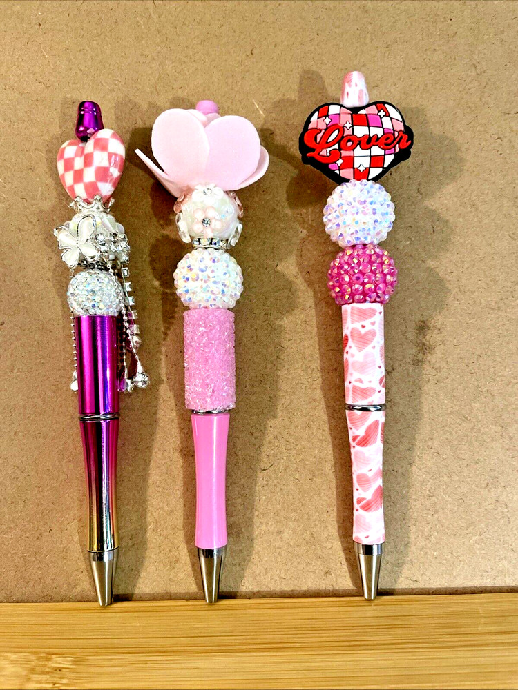 3 miscellaneous beaded pens with 1 ink refill each