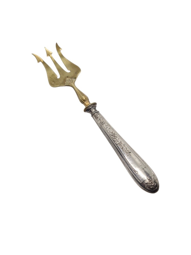 Vintage Antique brass fork with silver handle