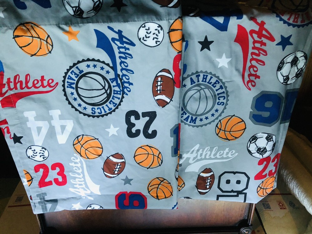 Two ￼Sports themed table runners 84x 30