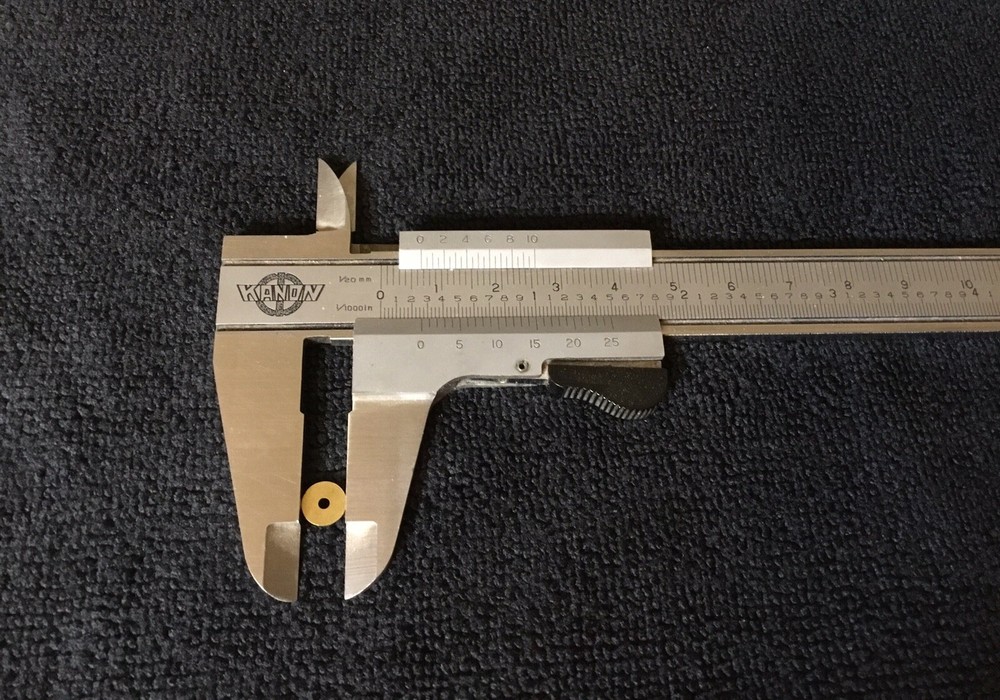 60 Brass inside pivot thrust washers custom made for straight razor restoration.
