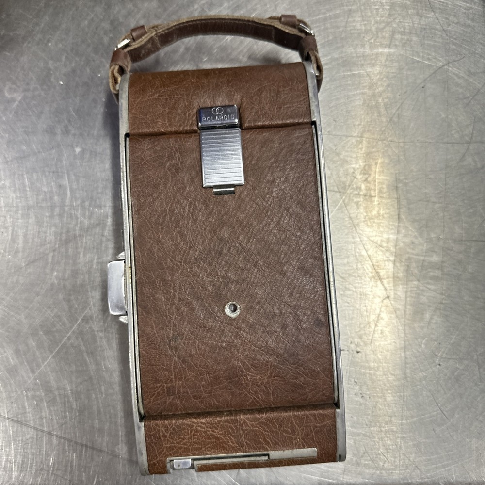 Polaroid land camera with case, Paper Work, Case Locks /Comes With Key. Model 95