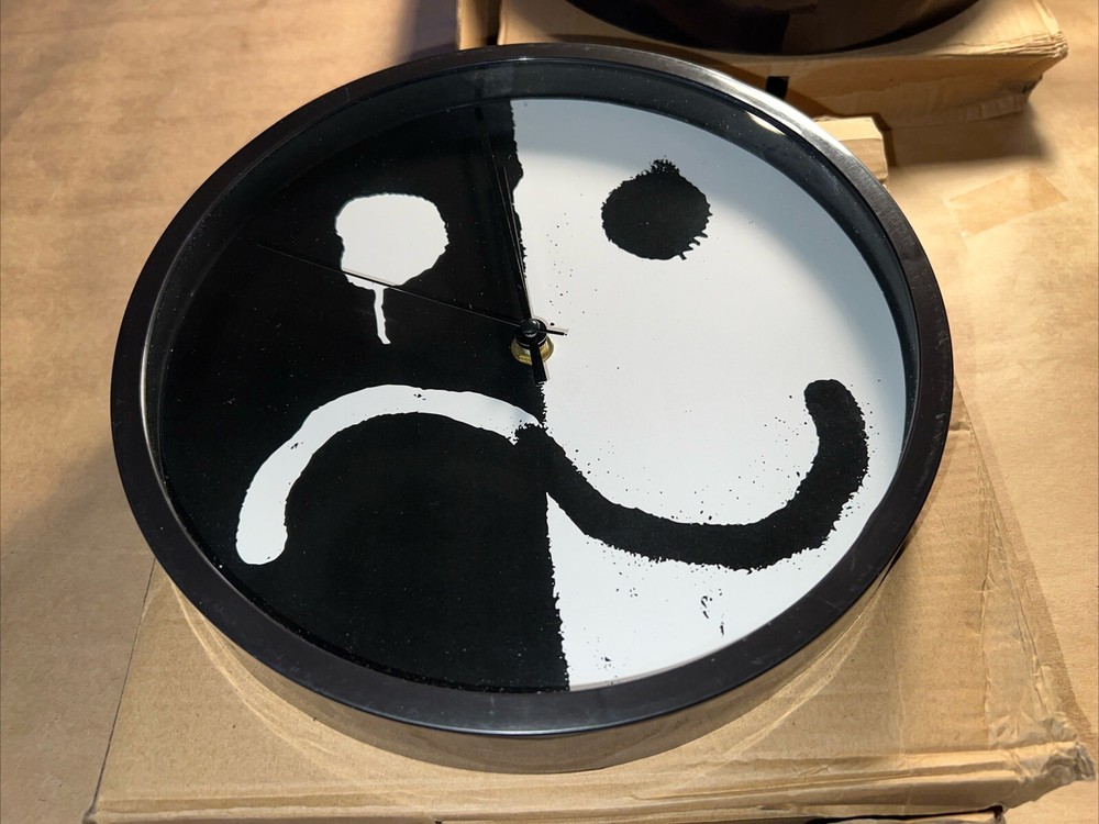 Two Smiley/Frown Wall Clocks - 9.75” Diameter