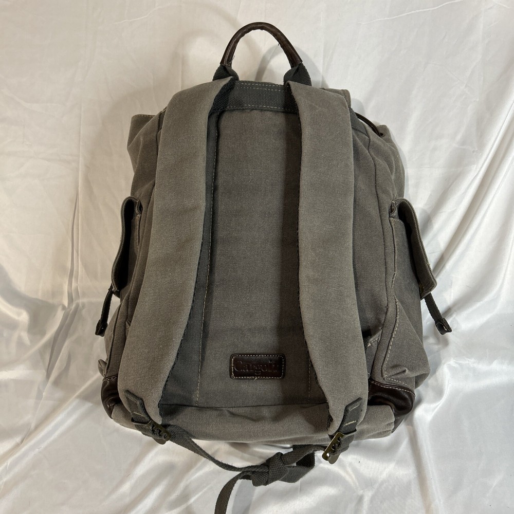 Cargoit Gray Canvas Backpack Magnetic Closures Pockets Straps and A Deep Inside