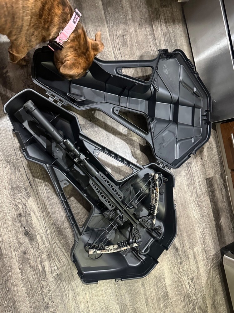 crossbow , with case arrows broadheads and pull cord.