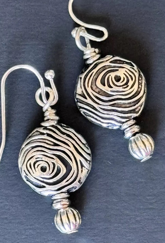 Etched Silver Dangle Earrings.