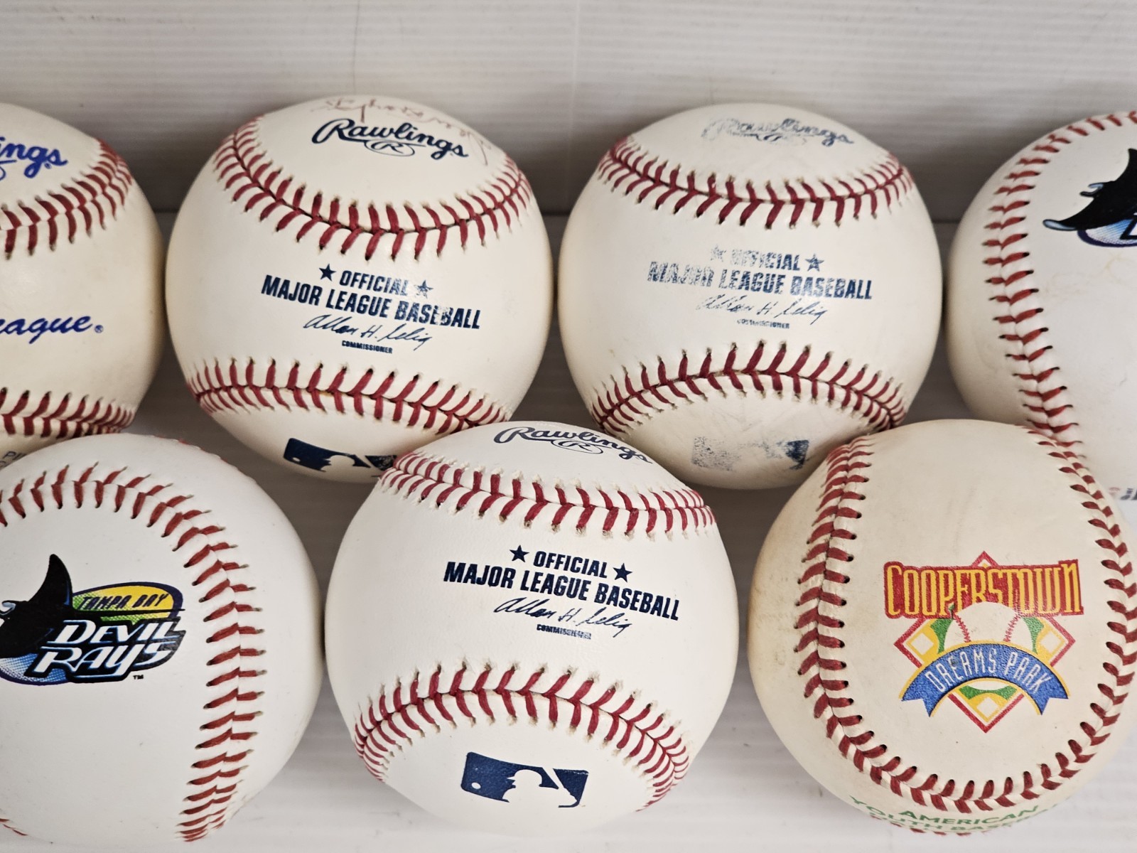 Mixed Lot of 7 Baseballs MLB Official Rawlings Devil Rays Cooperstown