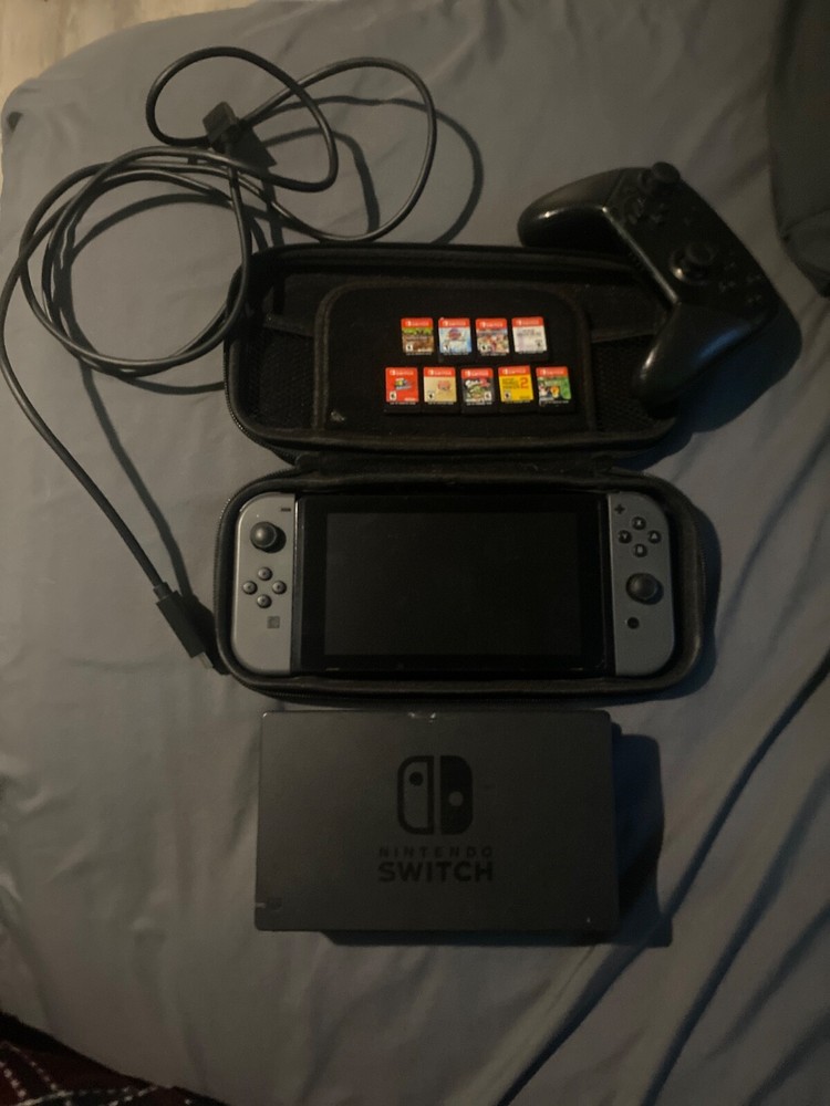 Used Black nintendo switch Super Bundle (Games)(Pro Controller)(carrying case)