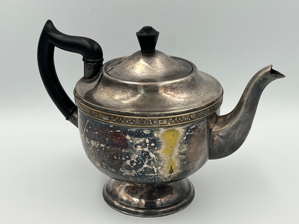Antique silver plated teapot.