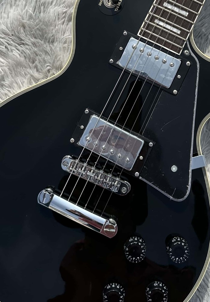 Customized electric guitar, black glossy, silver accessories, imported/from US