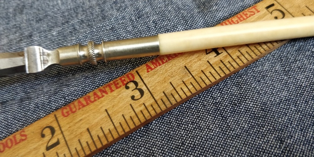 Vintage drafting Pen with white handle Bone?