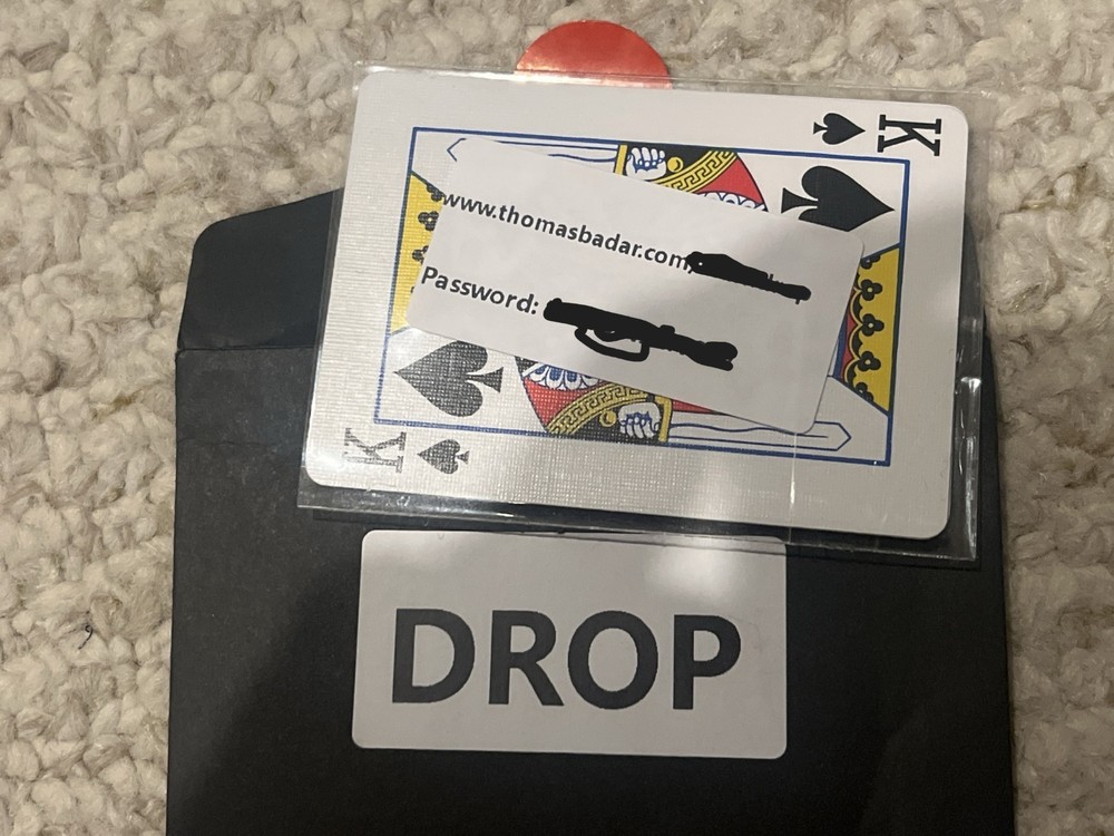 The Drop card-magic effect by Thomas Badar (with online instruction access).