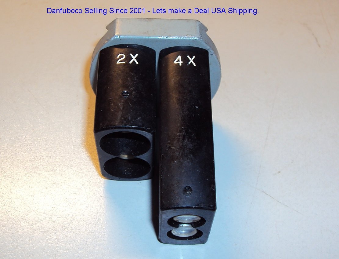 Microscope bottom lens unit 2X and 4X not sure who made it? Nice.