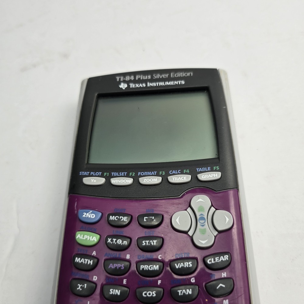 Texas Instruments TI-84 Plus Graphing Calculator Silver Edition Purple