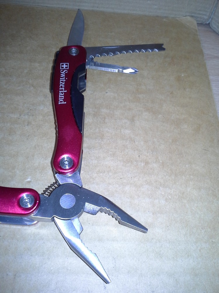 Switzerland Red Multitool Folding Pocket Pliers. VGC