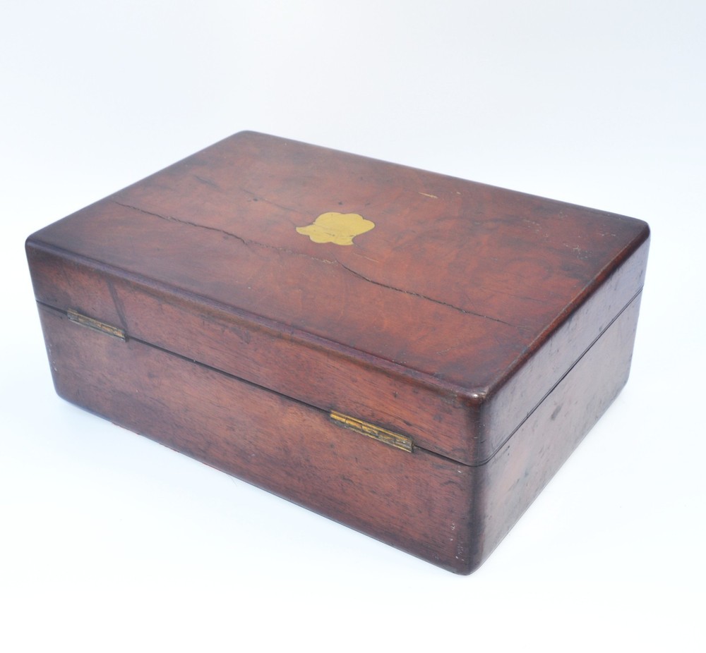 Brass microscope in case.