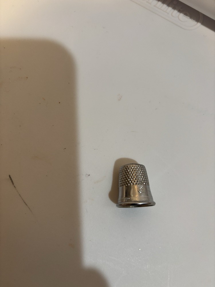 Five thimbles. Sizes 8, 9, 9,10,11
