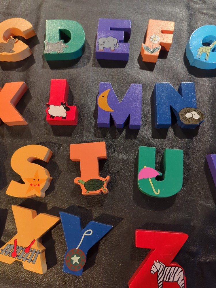 Solid wood alphabet letters in wood case
