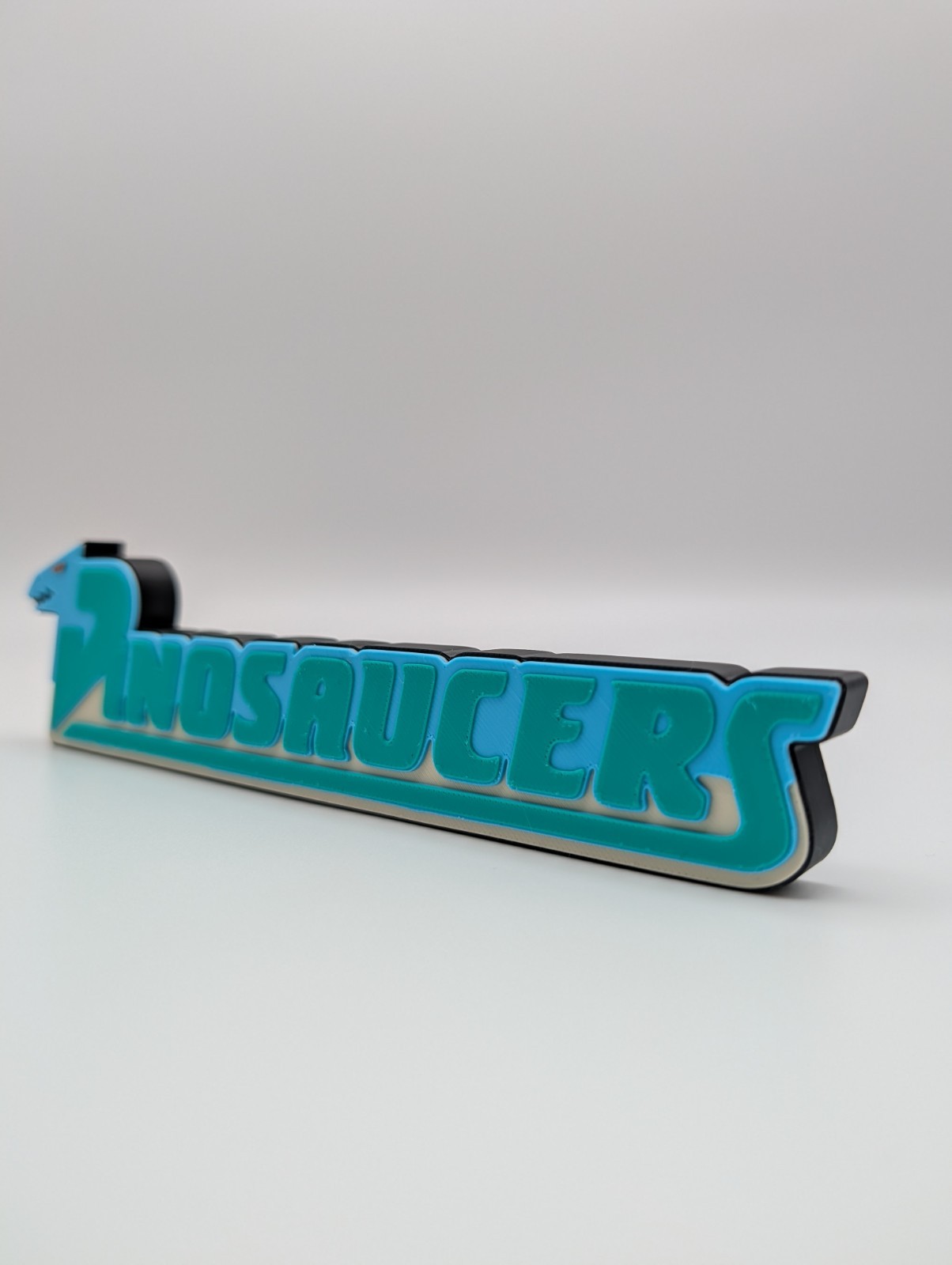 Dinosaucers Logo Display Sign For Collections