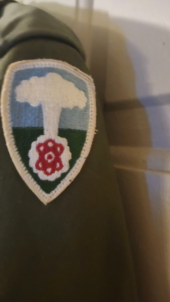 1940s era army issue trench coat atomic bomb white sands patch