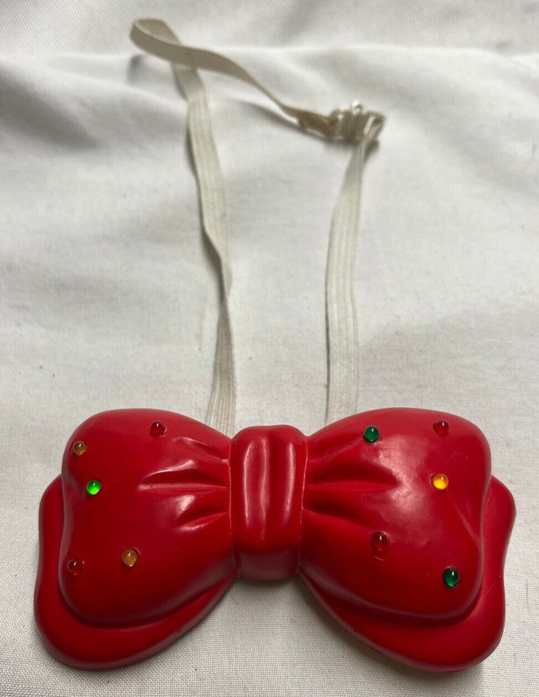 Blinking Light up plastic bow tie-  Needs 2 AAA Batteries