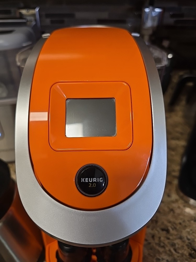 Orange KEURIG Coffee Maker With Carafe