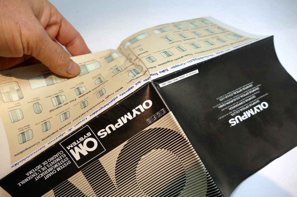 Olympus OM System chart lens accessory guide brochure