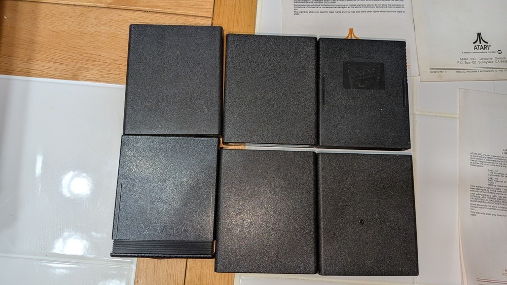 atari game, instructions, and limited 90 day warranty card bundle. no console