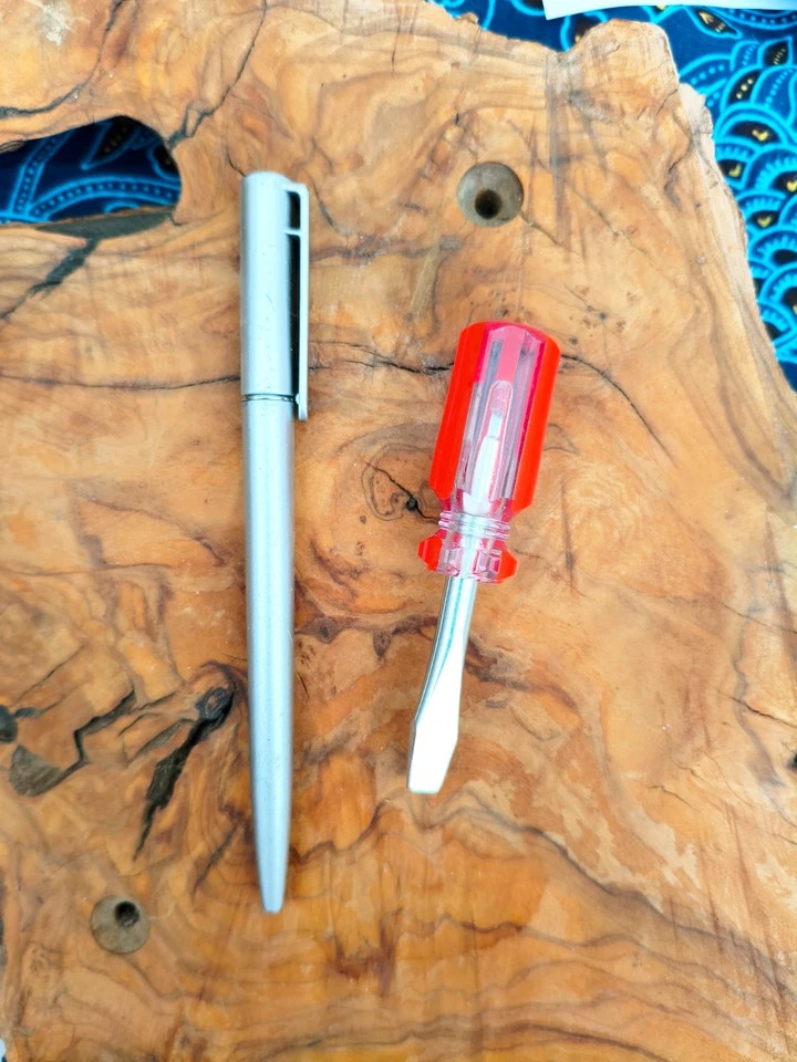 Small Screwdriver with Red Handle