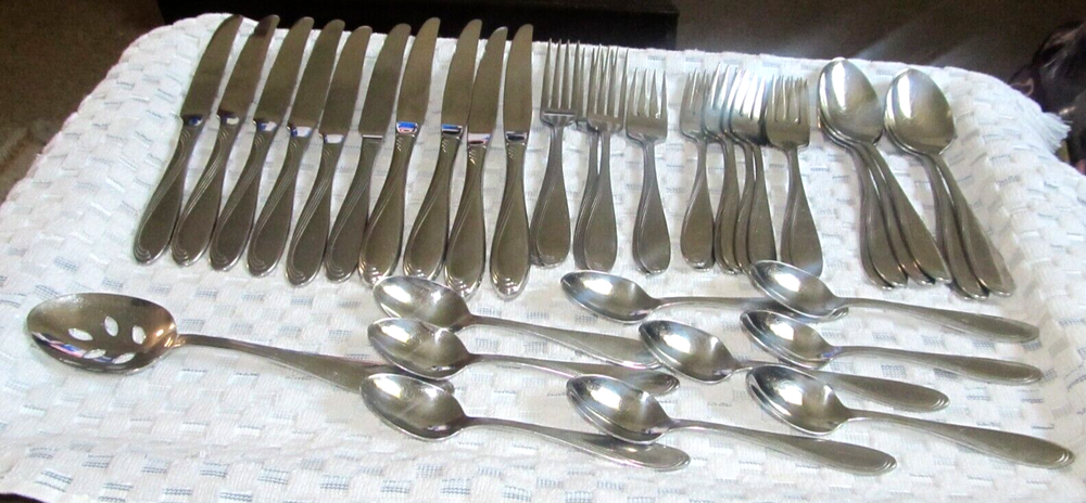 43 PC Oneida Camber Cresta Windswept Scroll Glossy Stainless Flatware
