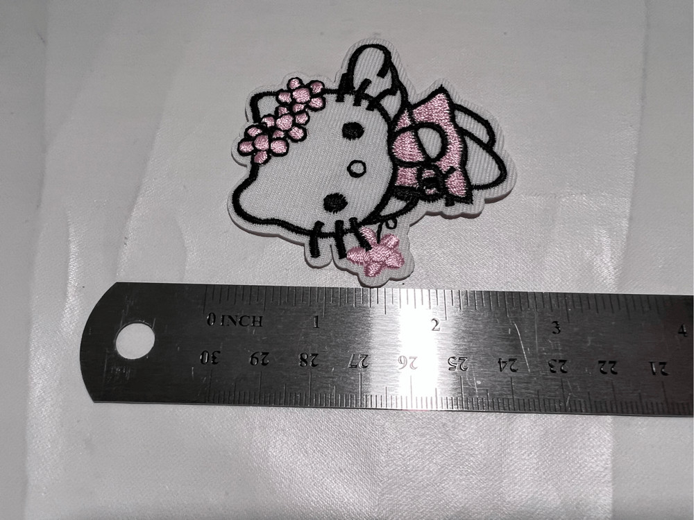 Hello Kitty as a Fairy with Flowers Iron on Patch