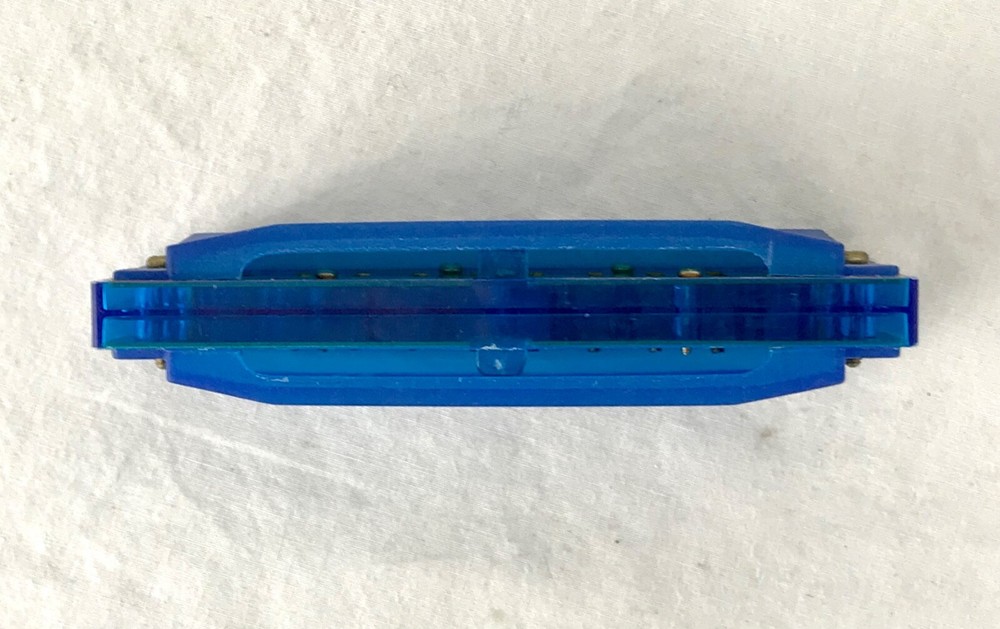 Two Hohner Harmonicas. Hohner Echo (C) & Blue Hohner (C)