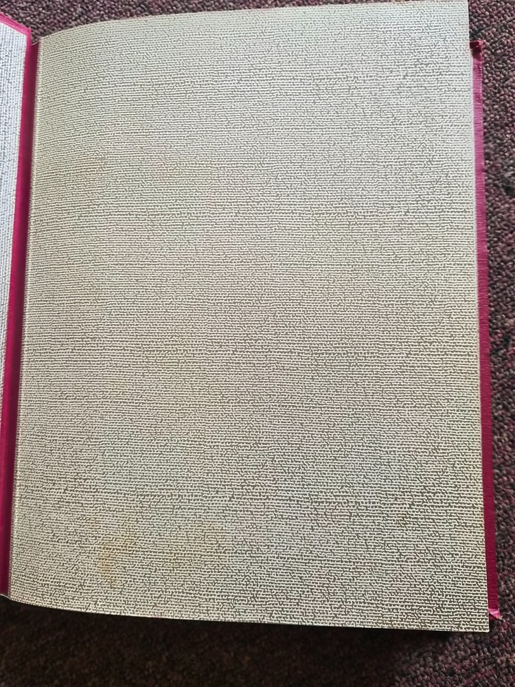 Vintage 1960's Red spring back Stamp Album with black leaves with interleaving