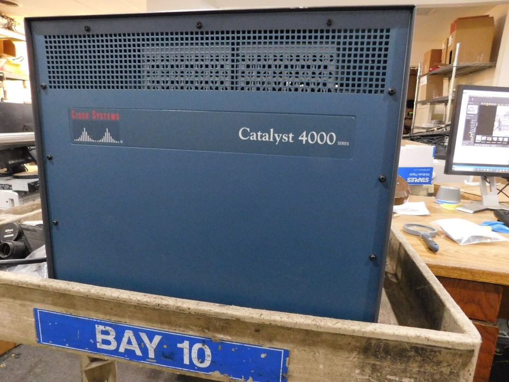 Cisco Catalyst WS-C4006 Switch.  See full description for installed Modules: