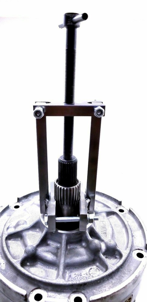 ,. A Transmission Pump Puller Tool with Adjustable Jaws pump extractor